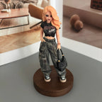 Real product photo of a personalized ChronoFig Goldilocks 3D figurine created from a photo and displayed on a wooden base.