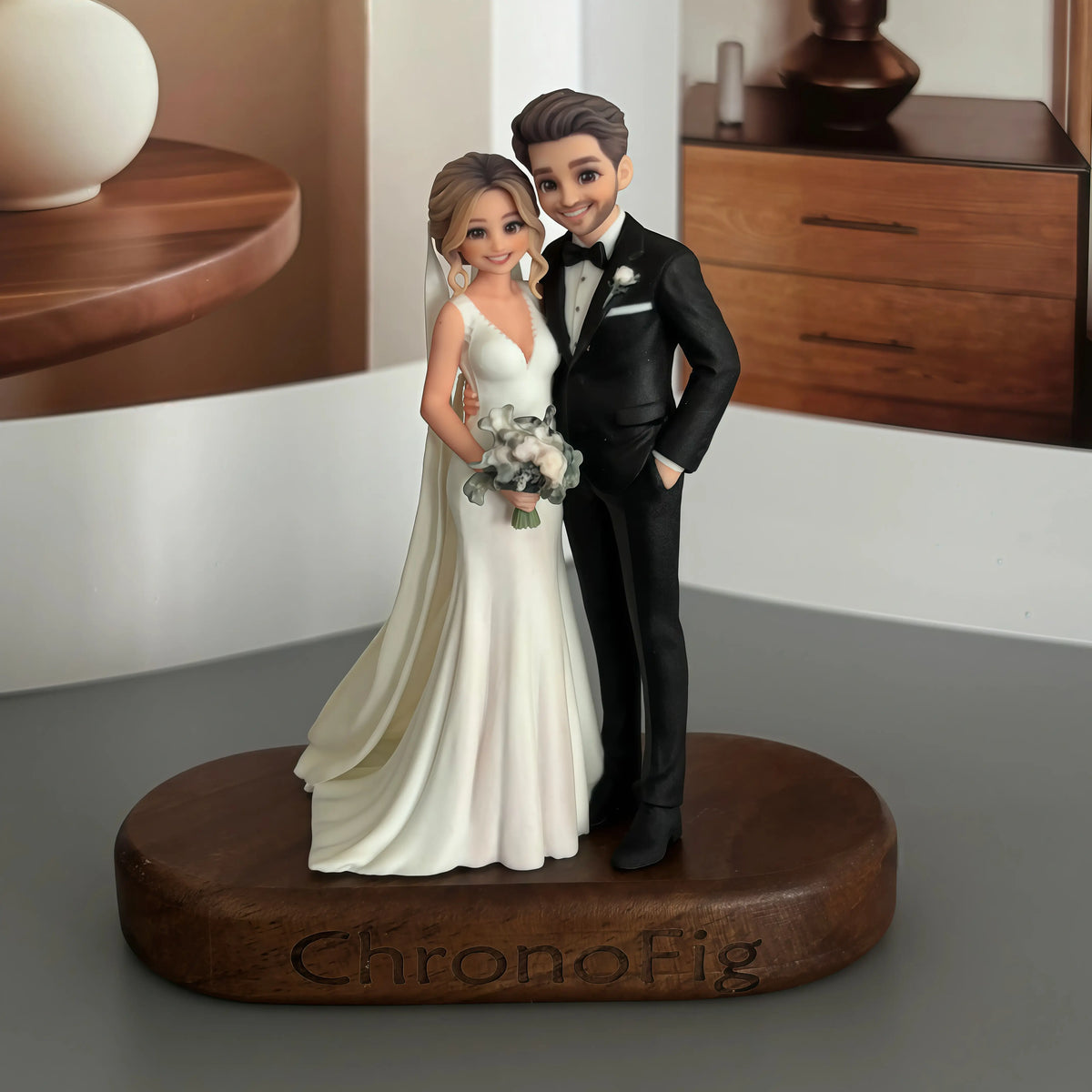 Real product photo of a personalized ChronoFig Newlyweds 3D figurine created from a photo and displayed on a wooden base.