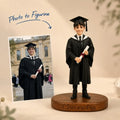Main product image showing a customer's photo transformed into a personalized ChronoFig figurine in Graduating Boy style.